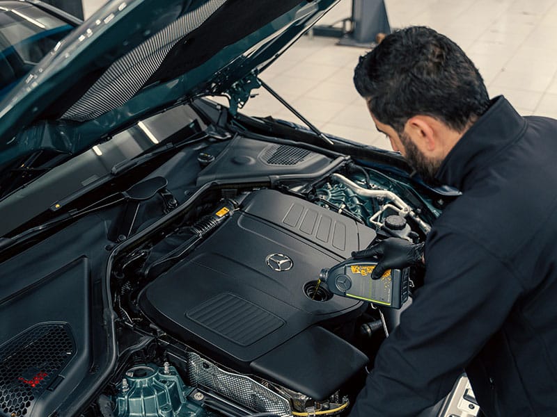 topping up oil after car engine repair